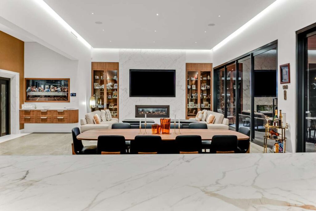 luxury open plan living with fireplace and wall mounted tv