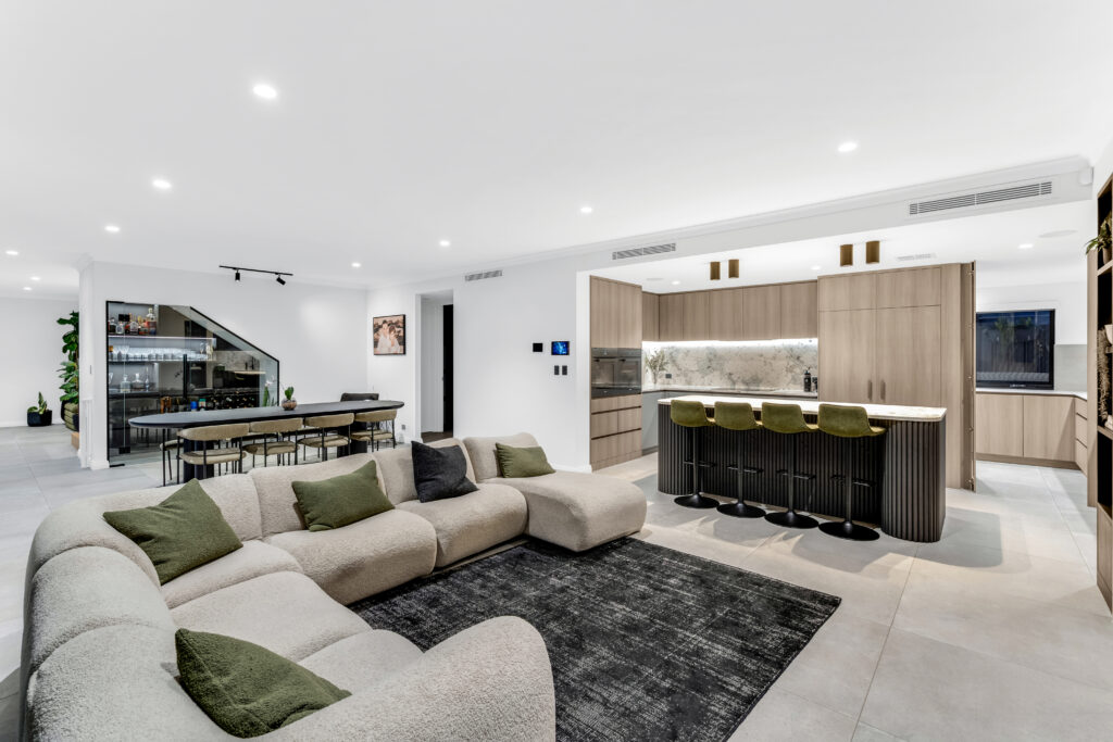 Luxury home interior designer Perth — open plan living and kitchen designed by Beaumonde Homes featuring custom joinery and premium finishes